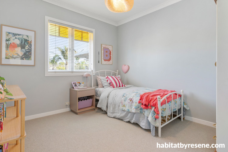 Girl's room painted in soft blue