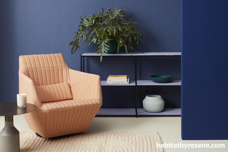 Living room featuring bold blue walls