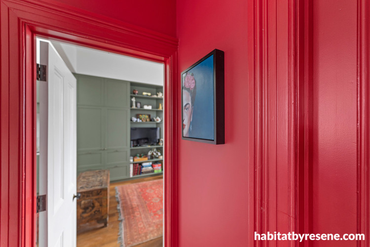 Interior feature walls painted in vibrant Resene Pohutukawa
