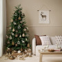 Living room featuring Christmas design in rustic, natural tones