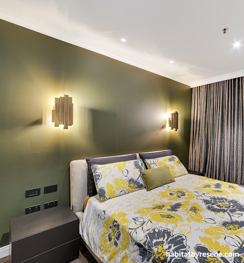 Bedroom with feature wall in Resene Scrub and ceiling in Resene Quarter Truffle