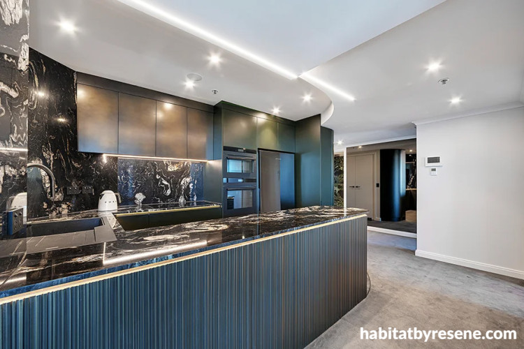 Kitchen and living area featuring Resene Quarter Truffle on the walls