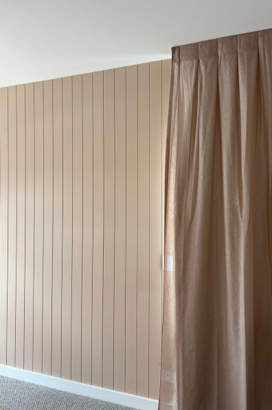 Warm neutrals and blush hues bring this Oratia home to life