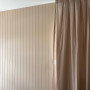 Master bedroom feature wall painted in Resene Shabby Chic with ceiling in Resene Quarter Rice Cake