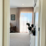 Master bedroom with walls painted in Resene Shabby Chic and ceiling in Resene Quarter Rice Cake