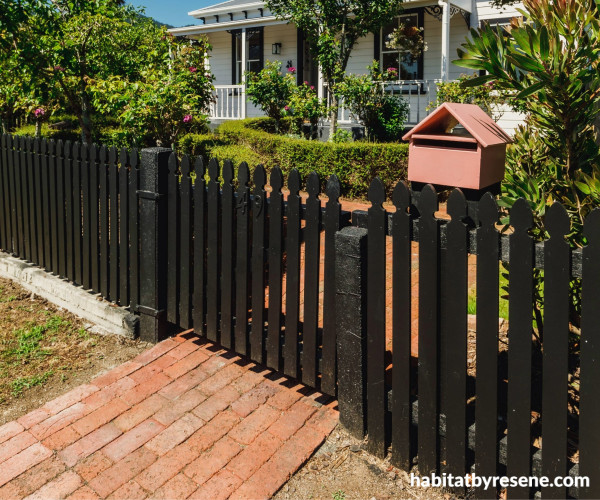 Fence painted in Resene Lumbersider in Resene Black