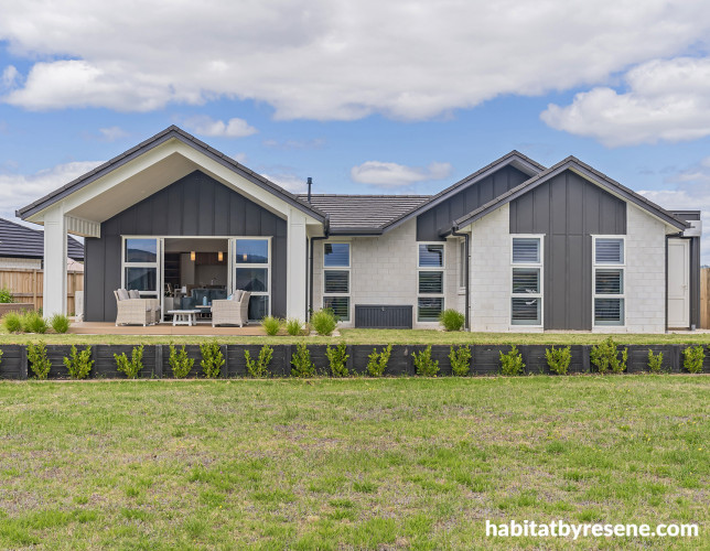 Two-toned house exterior with vertical cladding