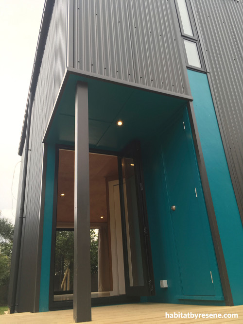 House exterior and back entrance featuring cerulean blue Resene Allports