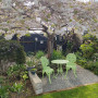 Outdoor table and chairs painted in Resene Sublime