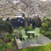 Outdoor table and chairs painted in Resene Sublime
