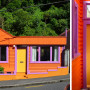 Bright orange Resene Tangerine house featuring colourful accents
