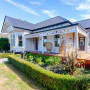 House exterior featuring Resene Truffle, Ebony and Dusky Pink