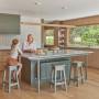 Kitchen painted in Resene Double Lemon Grass and with timber flooring and features