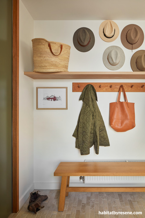 Entryway painted in Resene Double Lemon Grass and Resene Quarter Thorndon Cream