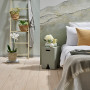 Bedroom featuring nature-inspired mural painted in multiple Resene colours