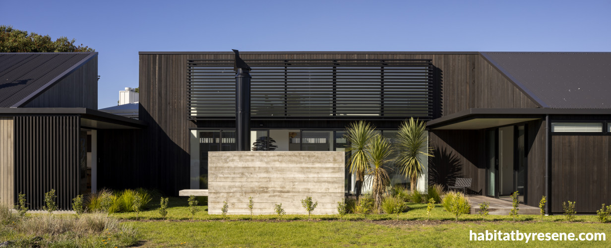 House exterior, dark house exterior, house exterior featuring Resene Wood-X tinted to Resene Foundry