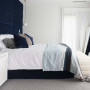 Bedroom, neutral bedroom featuring dark blue feature wall