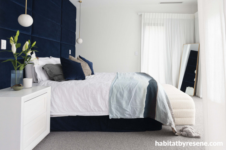 Bedroom, neutral bedroom featuring dark blue feature wall