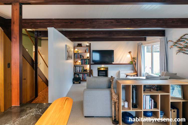 Living room, living room featuring neutral walls and exposed beams