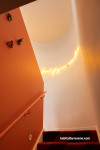 Stairwell painted in Resene Clockwork Orange