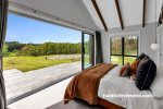 Master bedroom with light great walls and white ceiling