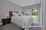 Bedroom painted in cool neutral tones