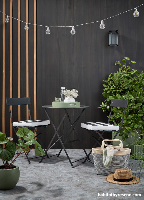 Outdoor porch with dark wood stain wall and battens