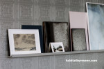 Wall with shelving featuring textured Resene wallpaper