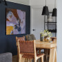 Blue feature wall adds character to dining room