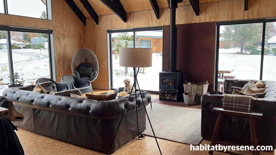Living area, living area featuring a natural wooden interior with Resene Black trusses