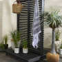 Dark dividing screen for using on outdoor deck or patio