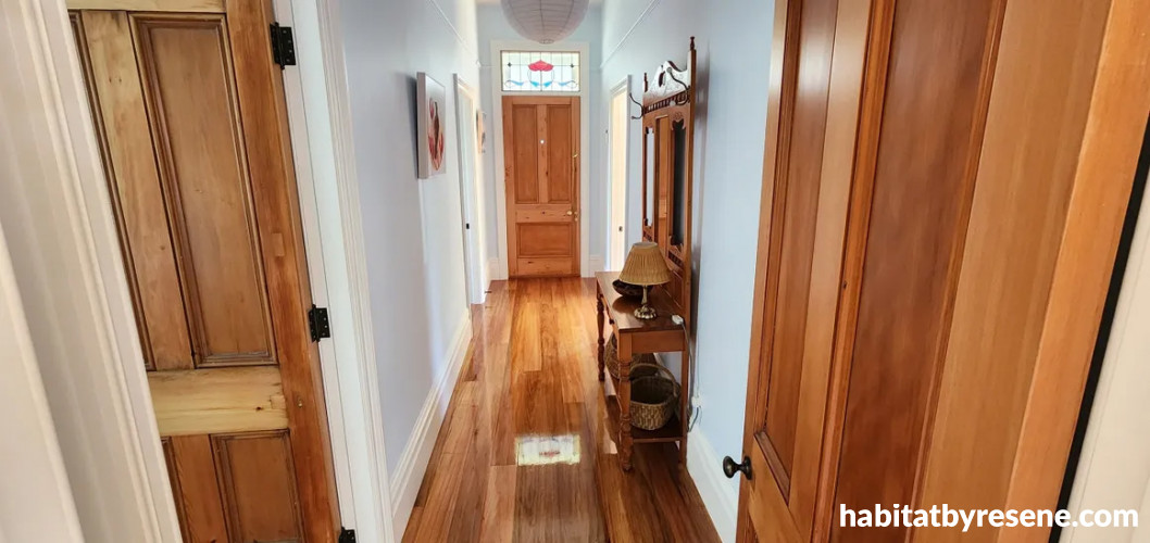 Hallway, hallway featuring neutral walls and wooden floors