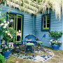 blue exterior, blue house, painted exterior, blue and green paint, courtyard, lime green