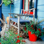 painted exterior, front deck, blue paint, red paint, colourful exterior