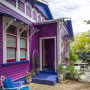purple house, purple exterior, blue exterior, painted weatherboards, bright house 