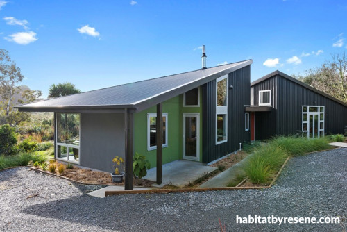 house exterior, black house, green feature wall, exterior feature wall