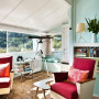 bach, holiday home, retro, turquoise paint, turquoise living room, lounge, raspberry chair