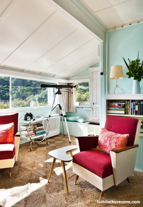 bach, holiday home, retro, turquoise paint, turquoise living room, lounge, raspberry chair