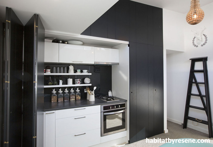 small home, black and white kitchen, black doors, black and white paint