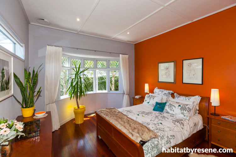 master bedroom, orange bedroom, orange feature wall, renovated villa, grey bedroom