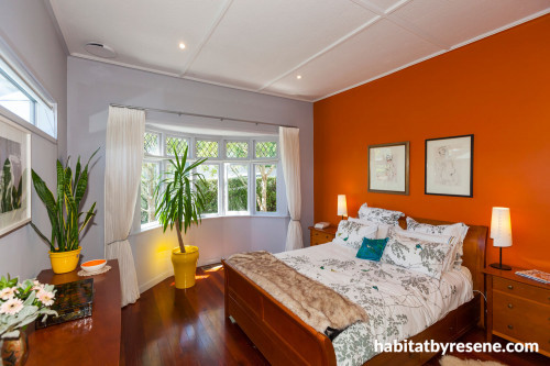 master bedroom, orange bedroom, orange feature wall, renovated villa, grey bedroom