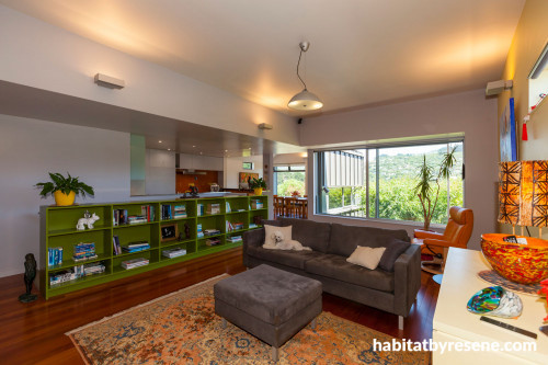 living room, lounge, renovated villa, grey living room, green bookshelf, grey paint