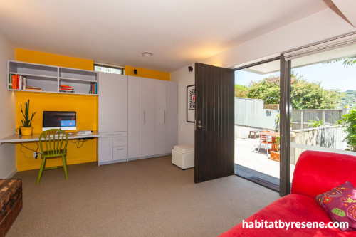 living area, lounge, yellow feature wall, white and yellow, renovated villa, yellow paint 