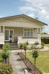 Gary and Mandy's Vibrant Red, Purple and Orange Bungalow