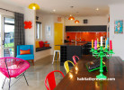 bright colours, dining room, kitchen, open-plan living, yellow door, painted door