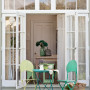 house exterior, deck, white doors, neutrals, outdoor dining, painted furniture