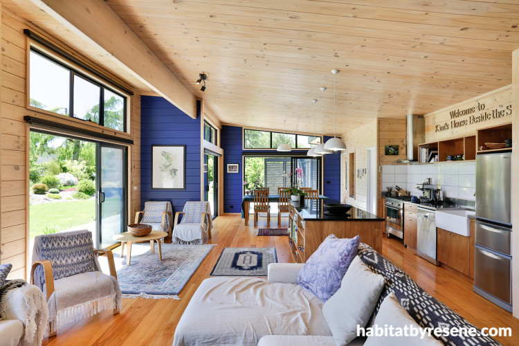 painted lockwood, lockwood interior, blue lockwood, blue feature wall, blue living area