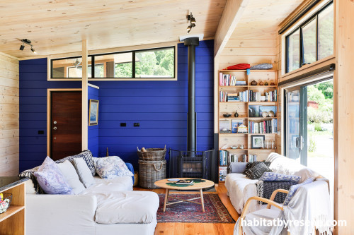painted lockwood, lockwood interior, blue lockwood, blue feature wall, blue living room