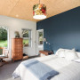 blue feature wall, blue bedroom, bedroom, plywood ceiling, blue and white bedroom
