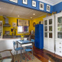 yellow kitchen, blue and yellow paint, blue dining room, blue fridge, bright kitchen 